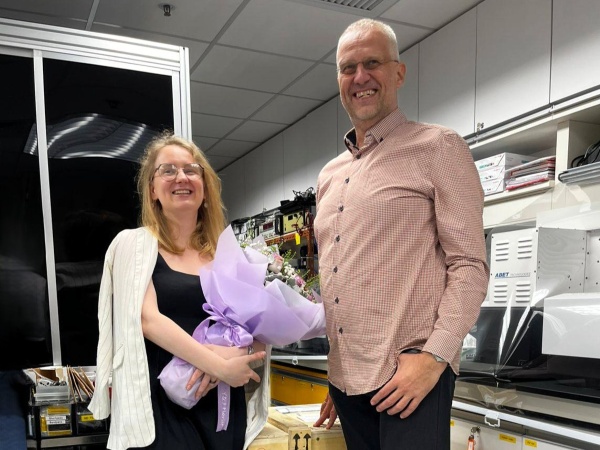 Dr. Kseniia Sergeeva and Prof. Andrey Rogach celebrating Kseniia's successful PhD defense at CityUHK in August 2025